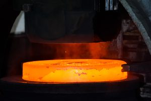 forging a metal plate
